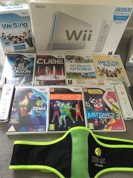 Nintendo Wii with 7 games and 2 microphones