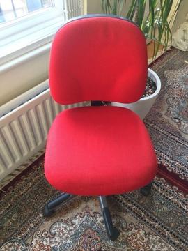 Red study/office chair on wheels