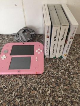 Pink Nintendo 2DS + 4 games