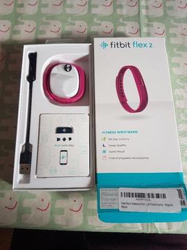 Magenta Fitbit Flex 2. Worn once. In brand new condition
