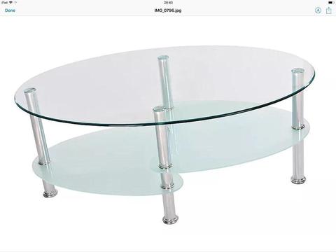 Oval glass coffee table with shelf