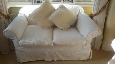 1 x 2 seater sofa. Loose covers. Very good condition