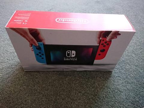 Nintendo Switch Neon brand new and factory sealed