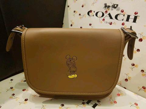 Coach New York Limited Edition Disney Patrica Saddle Bag in SaddleBrown