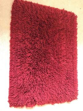 Red deep pile rug