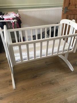 white wooden crib