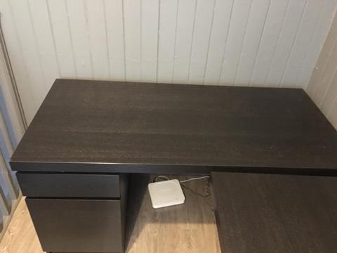 Two ikea desk with two leather chairs