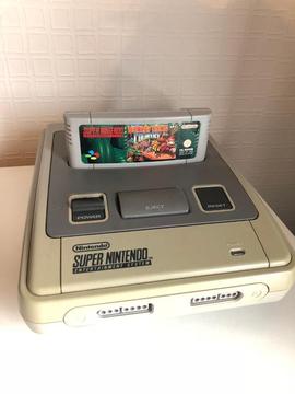 SNES perfect working condition + 2x controllers 4x games