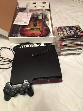 Ps3 slim 160gb with everything inc 12 games PlayStation 3 & guitar