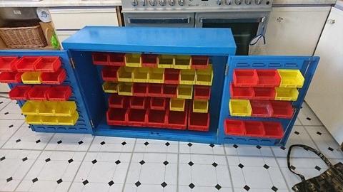 storage cabinet with various sized trays large heavy unit