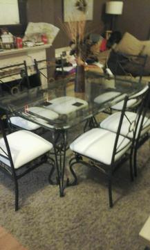 Glass top dining table and six chairs feel free to contact me
