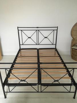 Black metal frame double bed