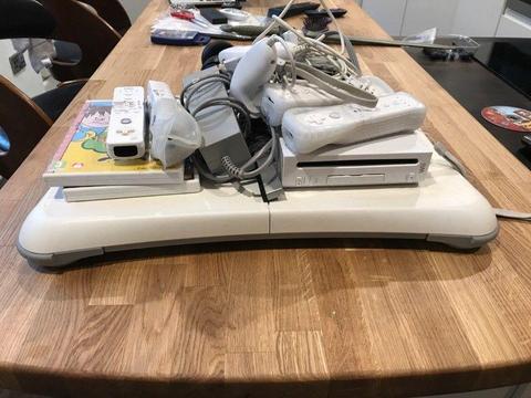 Nintendo Wii first generation, plus 3 games and wiifit balance board