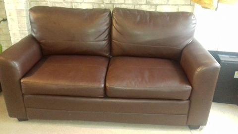 Faux leather brown sofa bed
