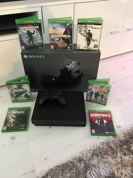 As new Xbox one x with 7 games