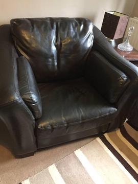 Large brown faux leather ‘bucket’ chair