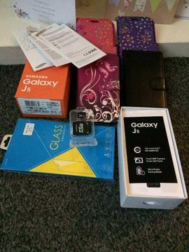 Samsung j5 with extras and Bluetooth headphones