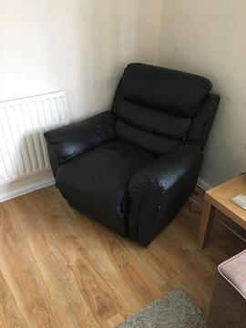 Black reclining arm chair