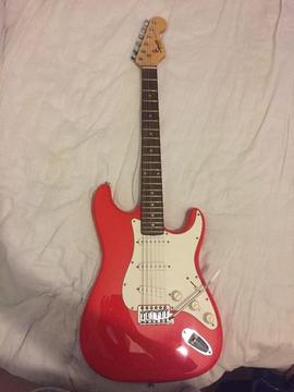 Perfect beginners guitar race red Squier strat
