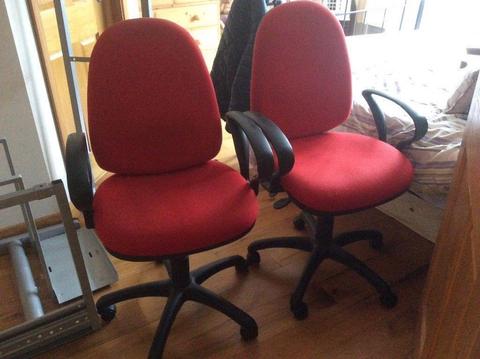 Red computer chairs, with back control and raiser levers. Very good condition