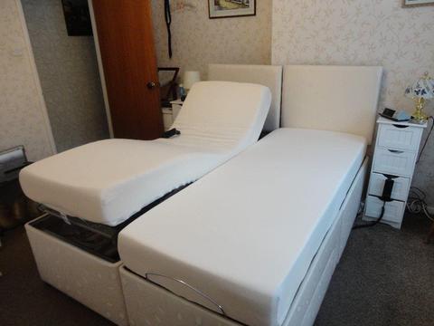 Double adjustable bed with separate side controls