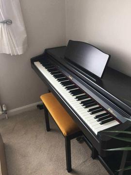 Roland digital piano HP147RE (with free sheet music)