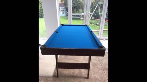 Pool table with balls