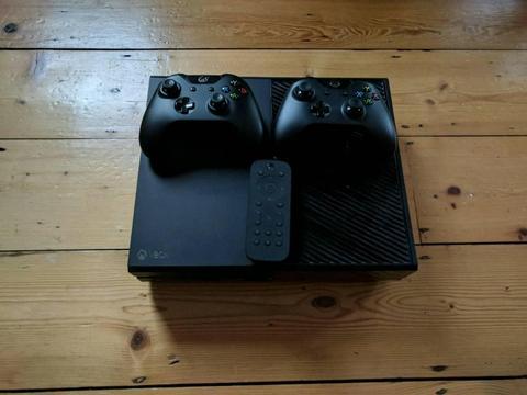 Microsoft Xbox One with 2 contorllers, dual dock charger and multimedia remote