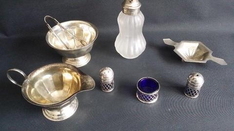 A selection of silver plate kitchen items
