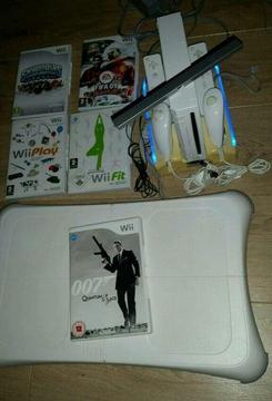 Nintendo Wii complete bundle with games and Wii Fit board