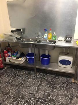Stainless steel double sink unit with hot water boiler