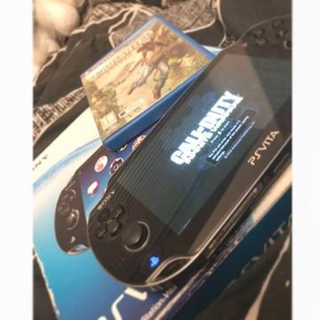 BOXED PSVITA WITH GAME & CHARGER