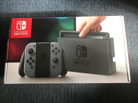 Nintendo switch and two games