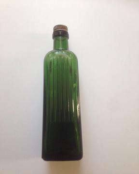 1893 medicinal bottle, square with ribbed on one side with original metal cap so very rare