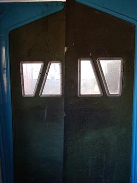Vintage industrial rubber swing doors