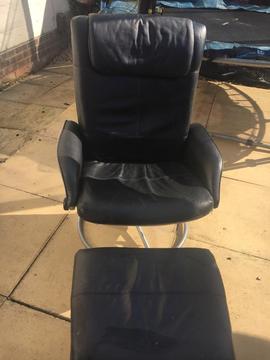 Free leather swivel chair and footstool