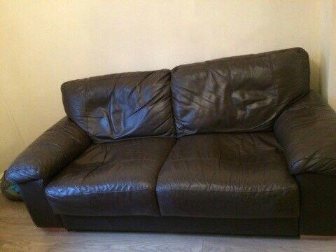 Two brown leather two seater settees