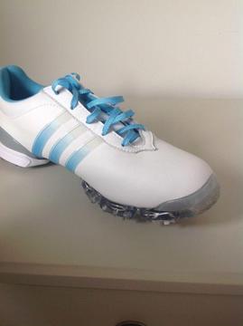 Ladies Paula Creamer golf shoes white and turquoise with bow detail at back