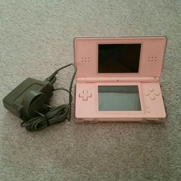 Nintendo ds lite console Comes with 5 games / charger/ cash or swaps
