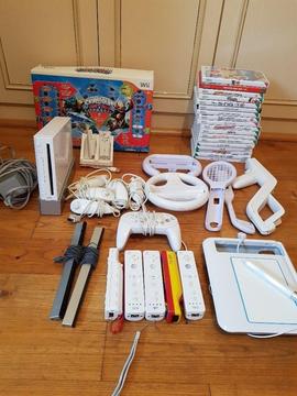nintendo wii with 18 games and lots of accessories
