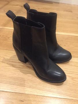 Black upper leather ankle boots