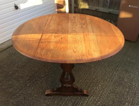 Lovely round wooden table. £25.00