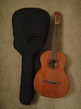 vintage Morris acoustic guitar and bag model 70