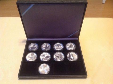 NINE COLLECTABLE 1 OZ SILVER COINS SOME LIMITED MINTAGES
