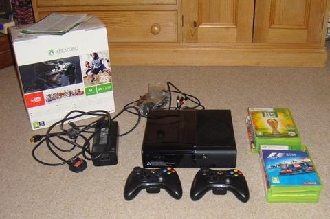 Microsoft 500Gb Black Xbox 360 S with 2 black wireless controllers and 8 games in original box