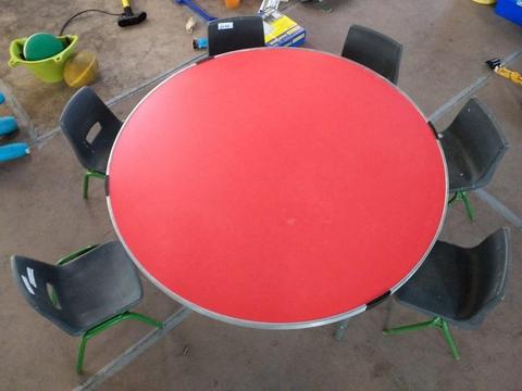 Large red table with folding legs