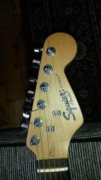 Fender Stratacaster by Squire. Excellent action Black with rosewood neck