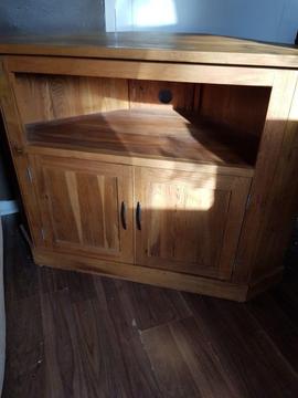 Solid wood corner tv unit, excellent condition , no deep scrapes or marks