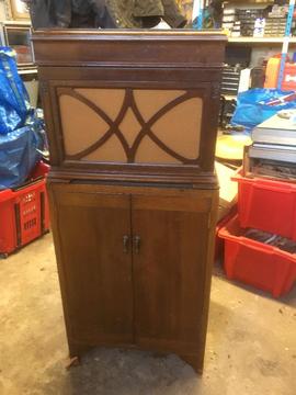 HMV gramaphone with record storage cabinet and approximately 500 records