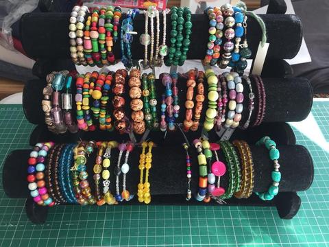 Large job lot of handmade jewellery and stand